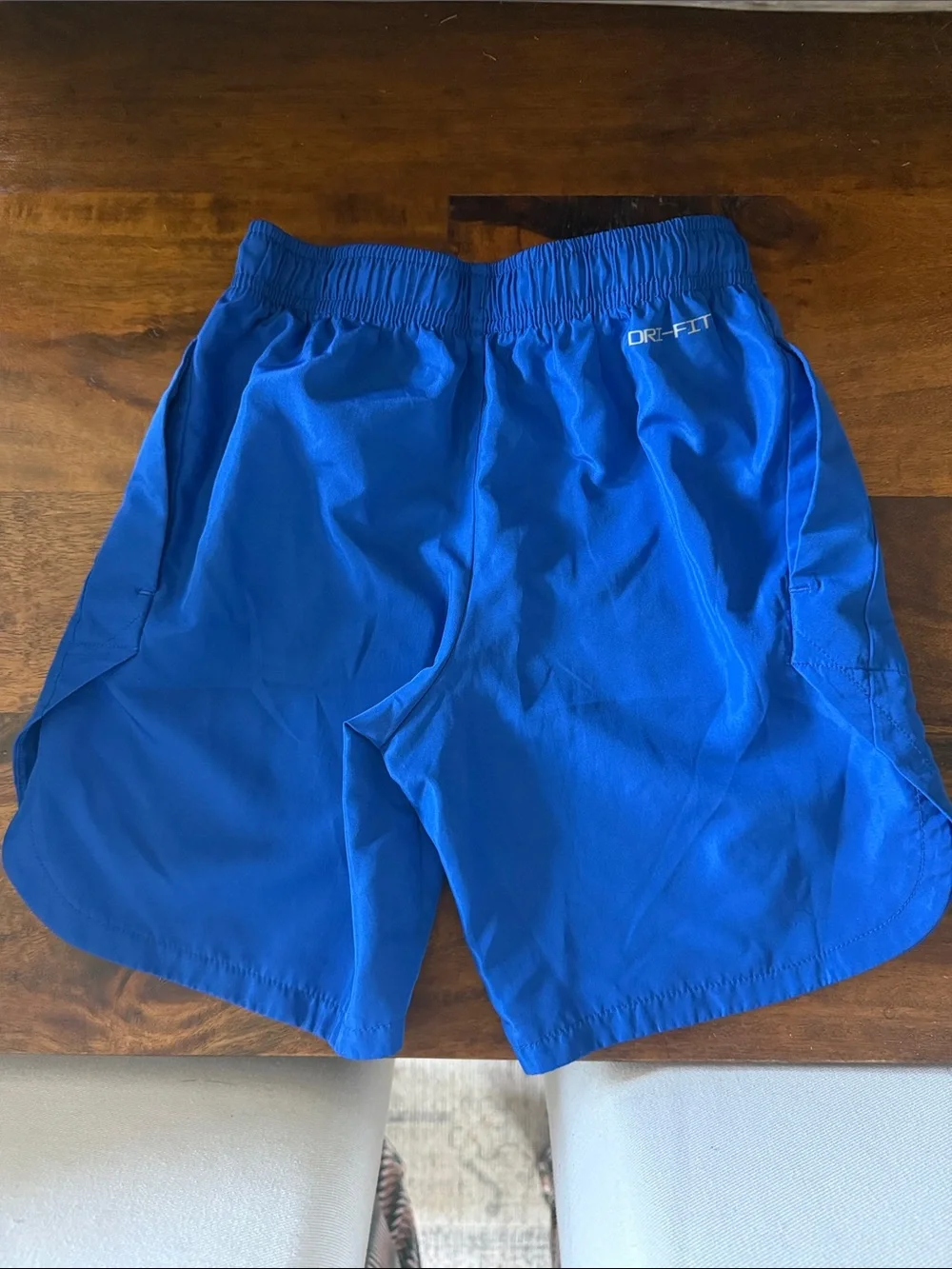 Nike Royal Blue Kids Athletic Shorts with Black Swoosh